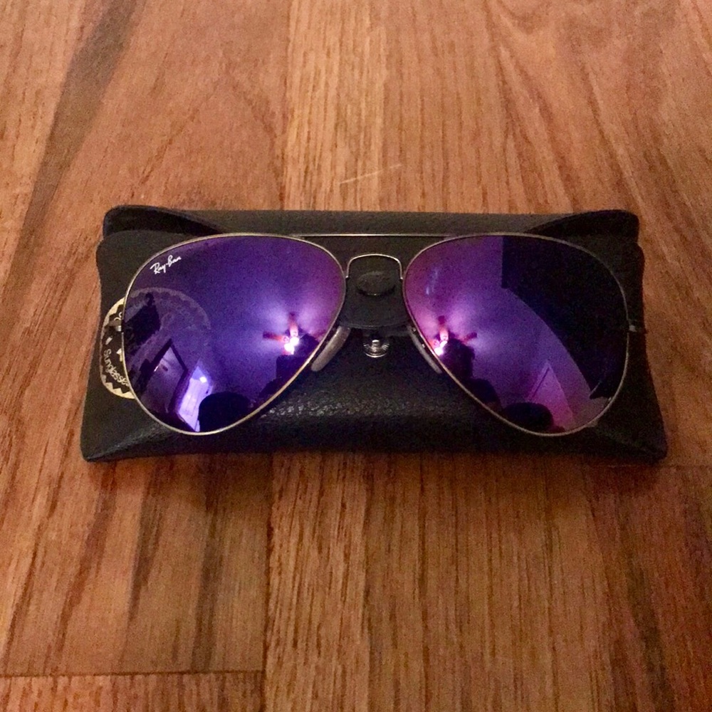 Ray ban aviators with purple lens.